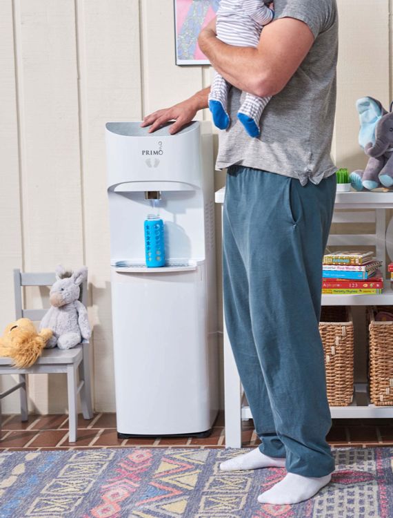 Consumer with a new water filtration unit at home